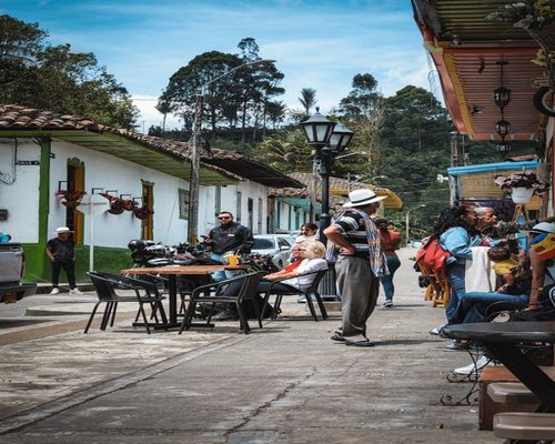Local people sitting and relaxing at a typical Costa Rican soda cafe